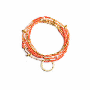 THE MAKERY HEART STRING NECKLACE IN CORAL AND SALMON