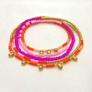THE MAKERY BEADED BRACELET ON ELASTIC IN BRIGHT PINK AND ORANGE