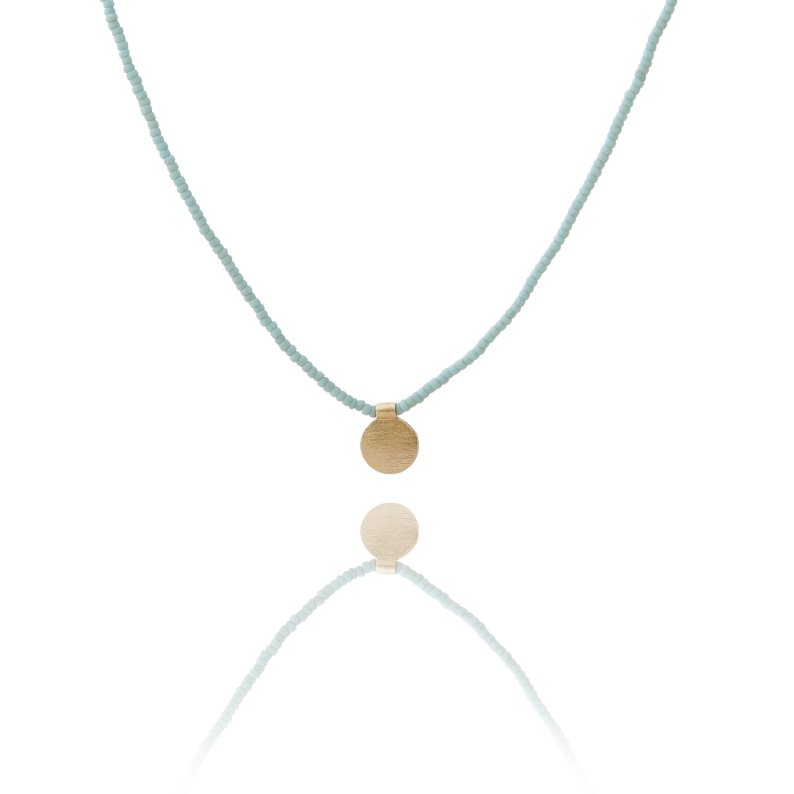 THE MAKERY SHORT BEADED AQUA NECKLACE BRASS DISK